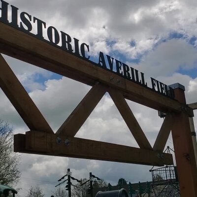 Historic Averill Field sign with cloudy sky in Washington State.